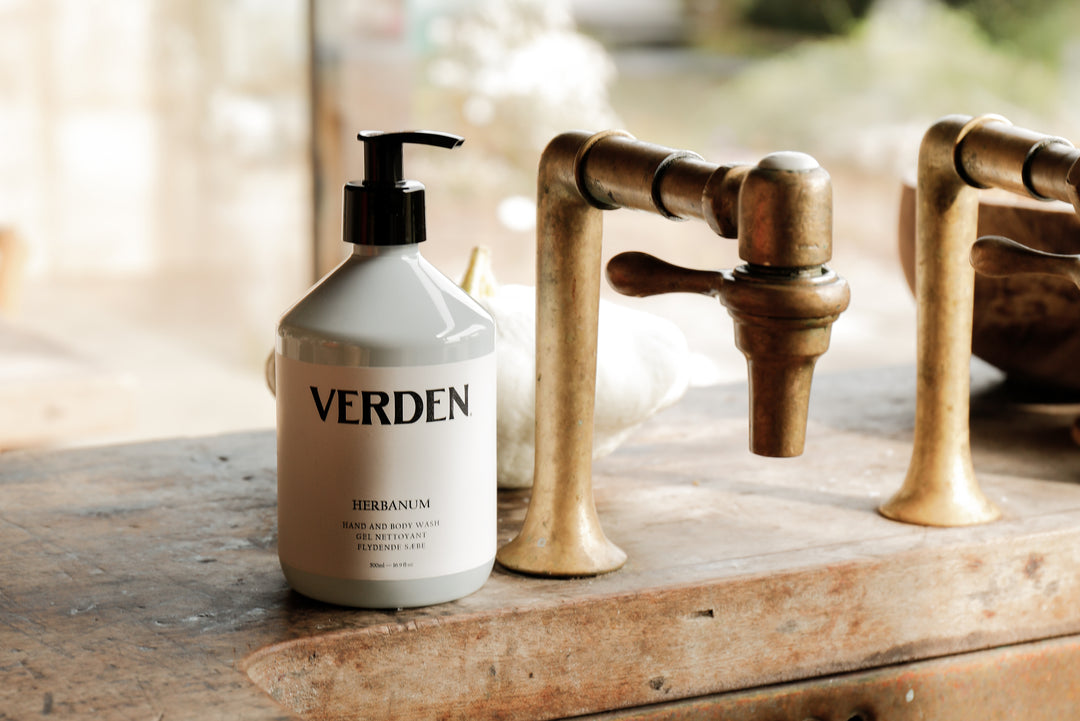 Herbanum Hand and Body Wash by sink