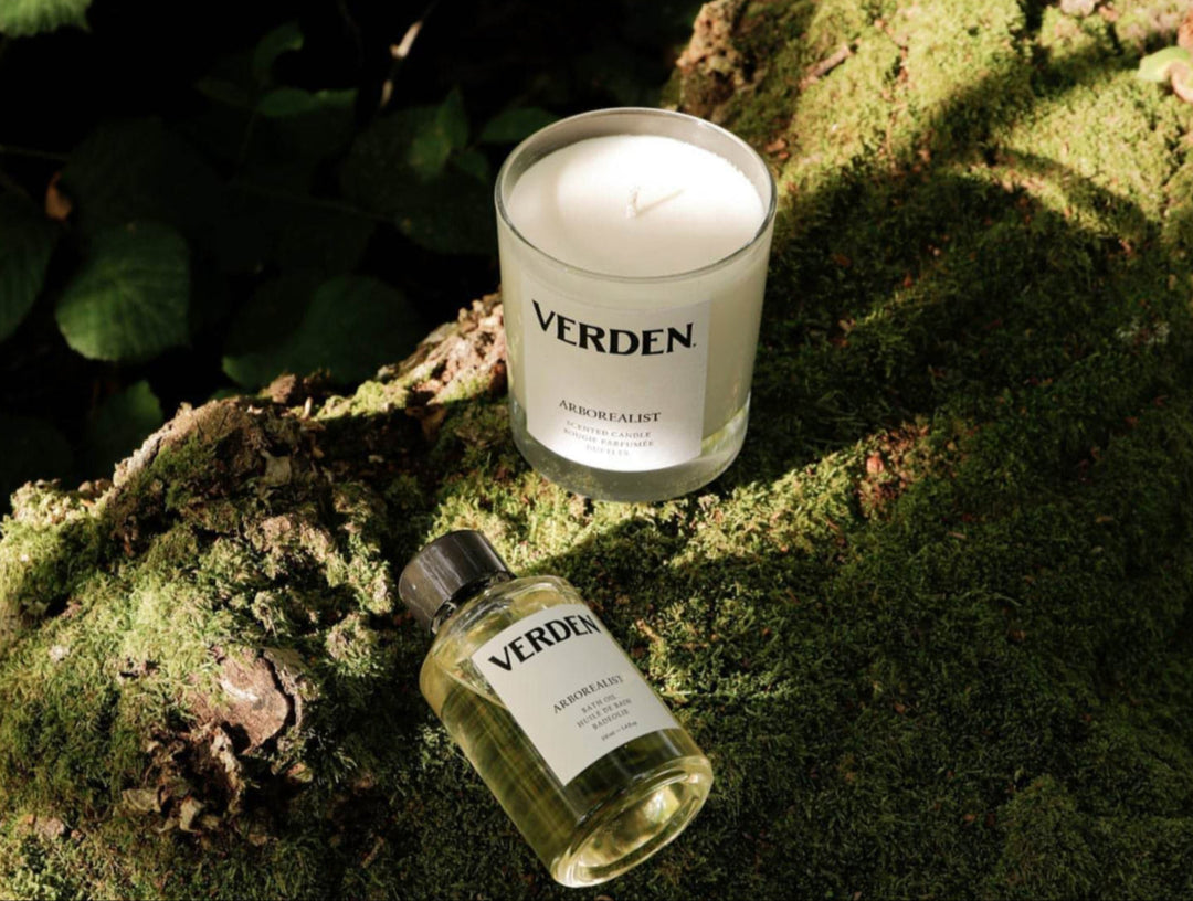 Arborealist Bath Oil and Scented Candle on moss